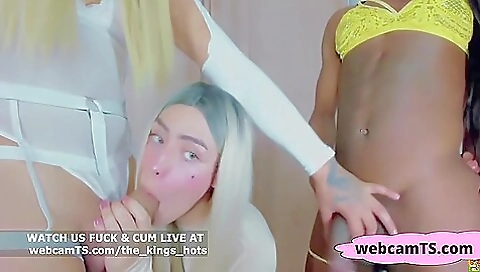 This video shows a deepthroated interracial threesome